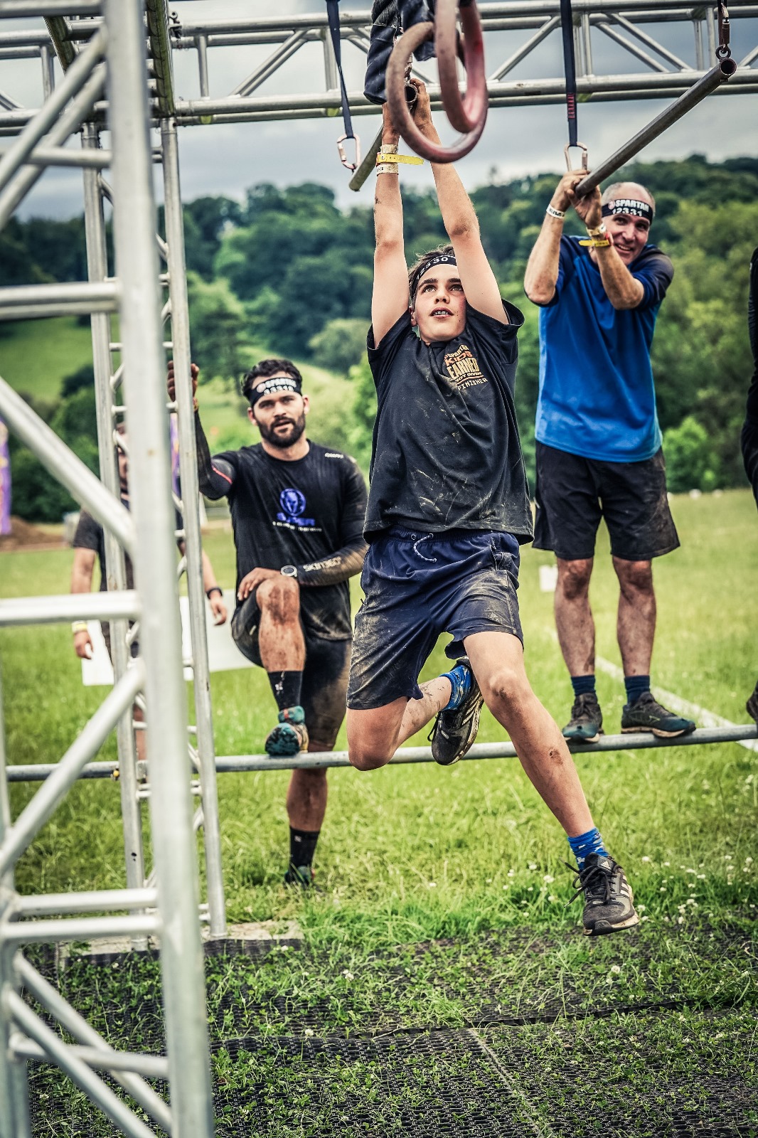 Me in a spartan race, doing monkey bars